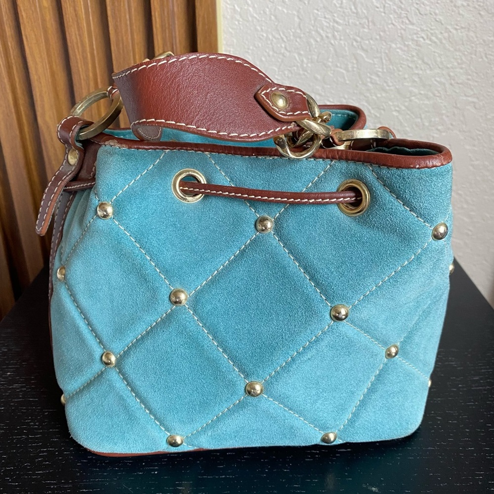 Claudia Firenze Quilted Drawstring
Nubuck Leather Handbag Studded
Bucket Bag - Picture 4 of 16